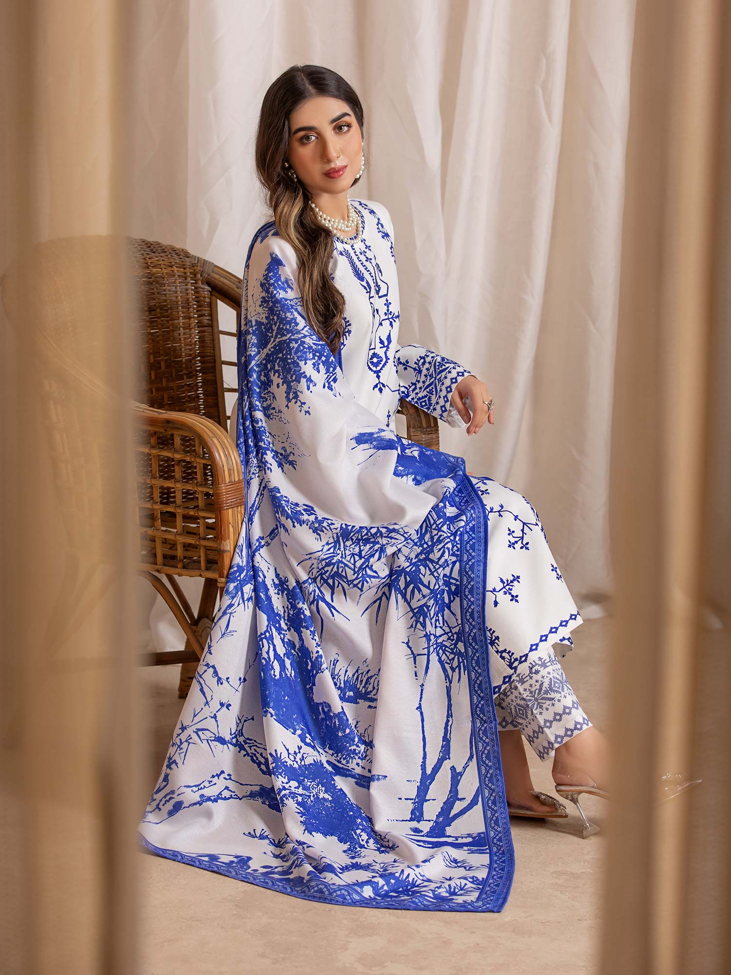 Heera's White & Blue Embroidered Dhanak Suit